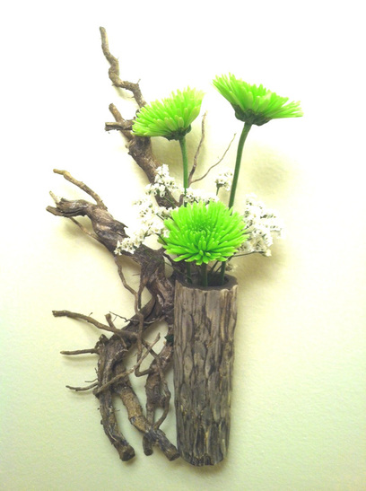 A PotterJohn Ikebana Relief Flower Arrangement